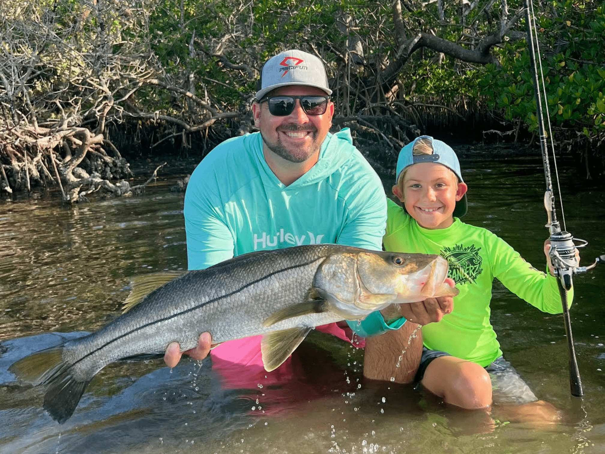 snook shot with kid